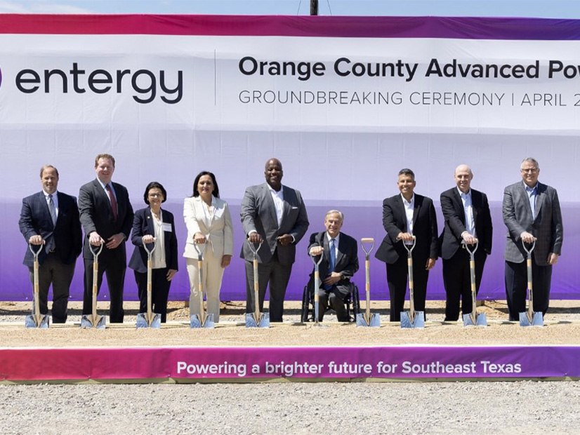 Texas regulators (first four on left) join Texas Gov. Greg Abbott (fourth from right) and Entergy senior officials for groundbreaking of the utility's Orange County Advanced Power Station.  