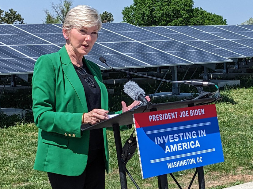 Energy Secretary Jennifer Granholm announces new funding for community solar with D.C.'s largest community solar project as a backdrop.