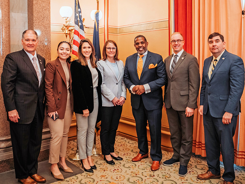 NYSERDA President Doreen Harris (center) poses Thursday with members of the N.Y. Senate Energy and Telecommunications Committee. From left are Sens. Mario Mattera, Kristen Gonzalez, Michelle Hinchey, Kevin Parker, Mark Walczyk and John Mannion.