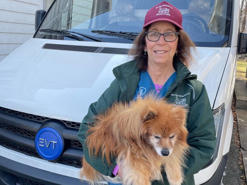 Faith Krausman, a Montclair, N.J., veterinarian, in front of the logistics high top cargo van that she is converting into a mobile clinic.