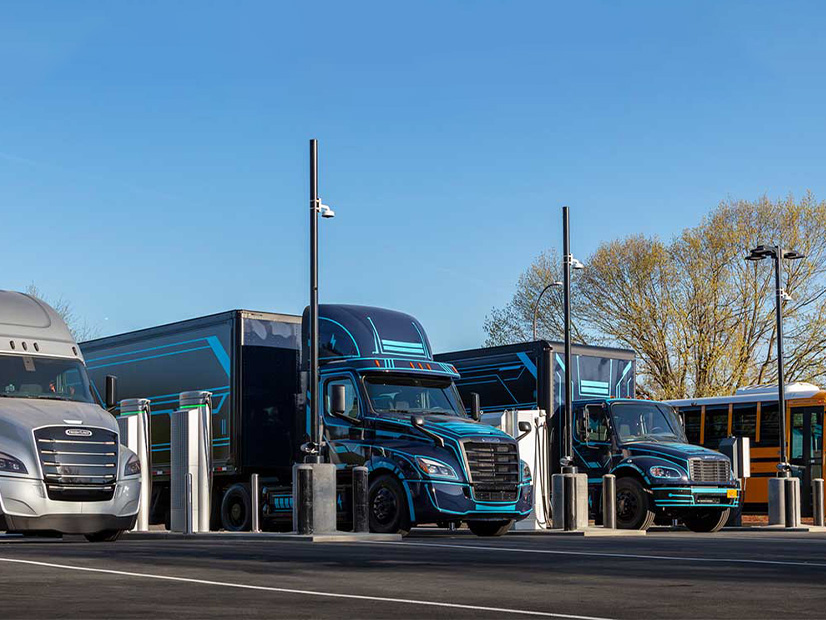 Trucks charging on "Electric Island" in Portland, Ore., a charging site developed jointly by Daimler Trucks North American and Portland General Electric to help accelerate development and deployment of zero-emission heavy-duty trucks.