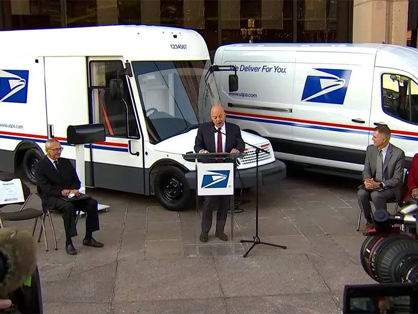Postmaster General Louis DeJoy announces the purchase of 66,000 battery powered next generation delivery vehicles (left) and Ford E-Transit vans (right).