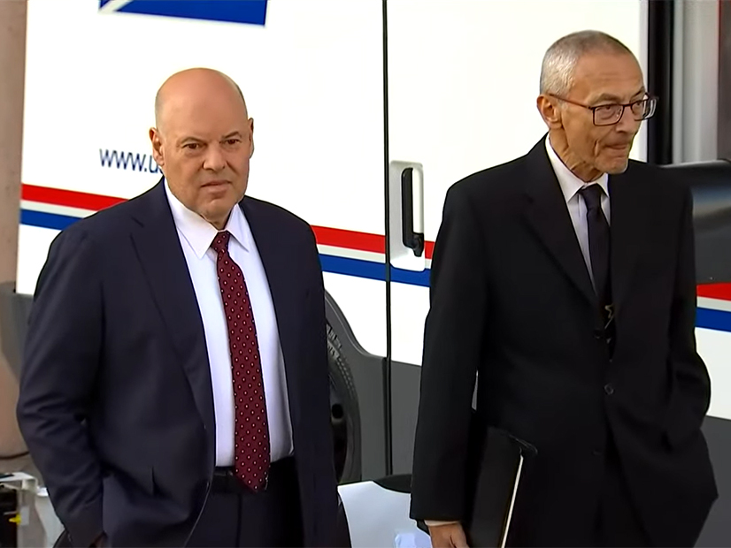 Louis DeJoy John Podesta (WUSA9) Alt FI.jpg