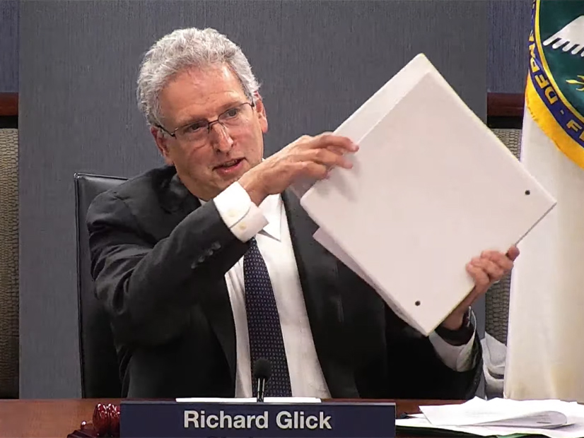 Richard Glick and his binder of grievances (FERC) Alt FI.jpg