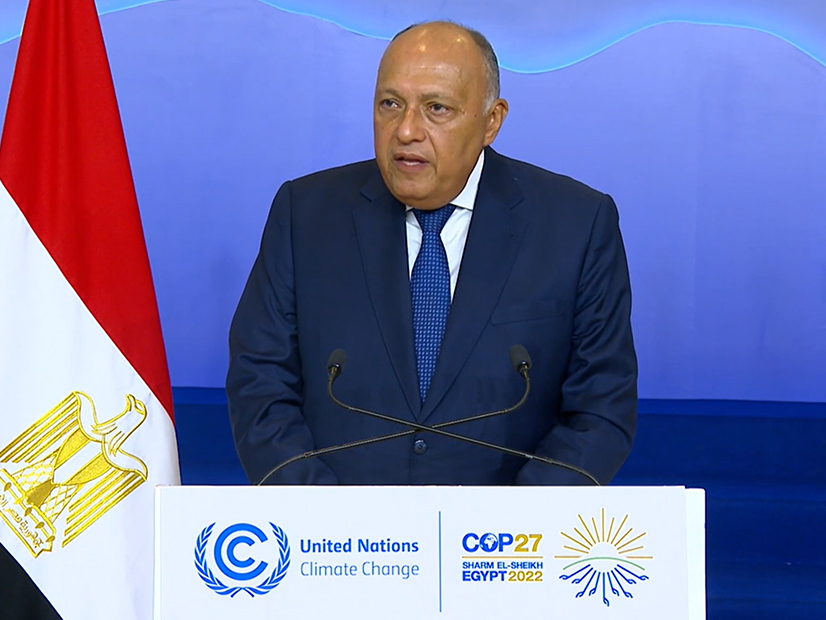 COP27 President Sameh Shoukry addresses the conference's closing plenary in the early hours of Sunday morning.