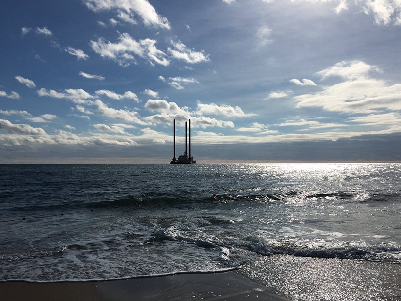 A lift boat working on South Fork Wind is seen from the south shore of Long Island. Sunrise Wind, a sister project also being developed by Orsted and Eversource, cleared a significant New York regulatory hurdle Thursday.