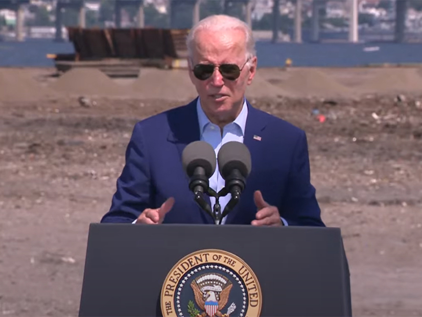 President Joe Biden speaks at Brayton Point in Massachusetts, the site of a former coal plant, where undersea cables for offshore wind projects will soon be built.