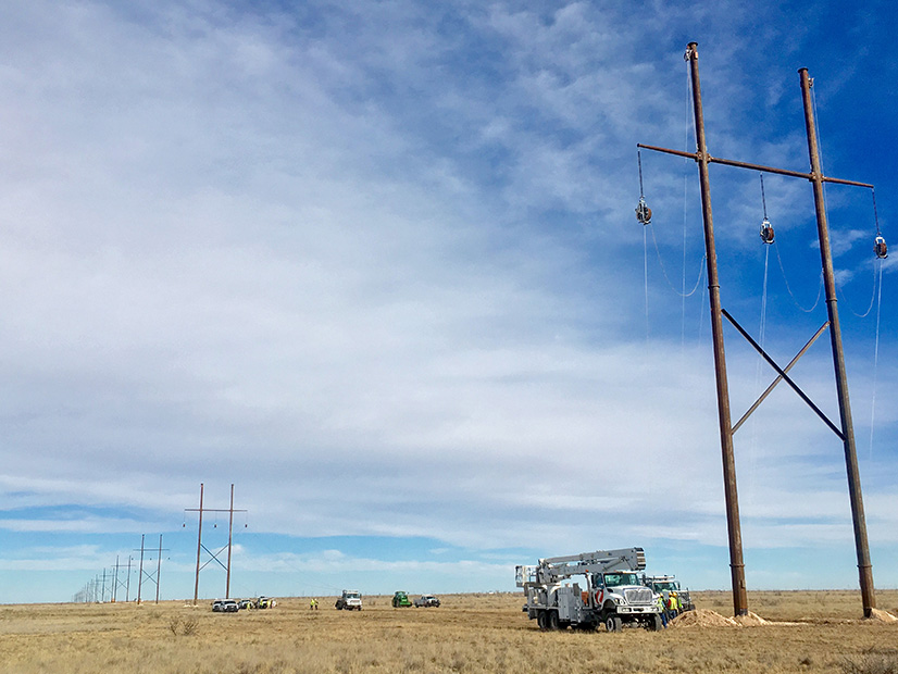 Xcel Energy service crews work on a new transmission line in West Texas. 