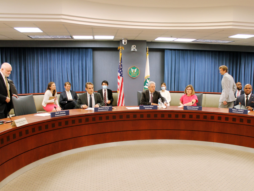 FERC, meeting in public for the first time in two years, voted unanimously to approve proposed rules to speed generator interconnections.