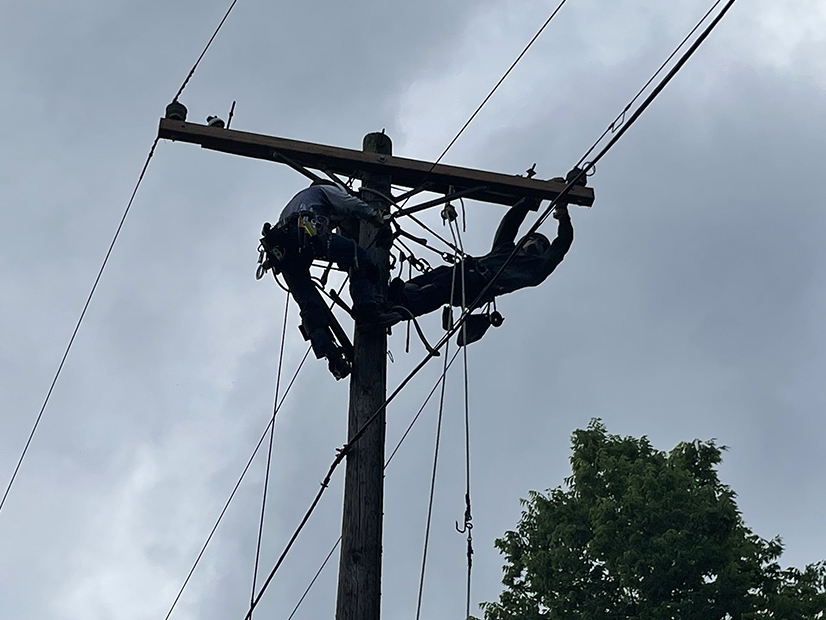 AEP Ohio linemen work to restore power.