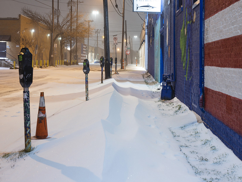 A snow-covered sidewalk in Deep Ellum, Texas, during last February's winter storm