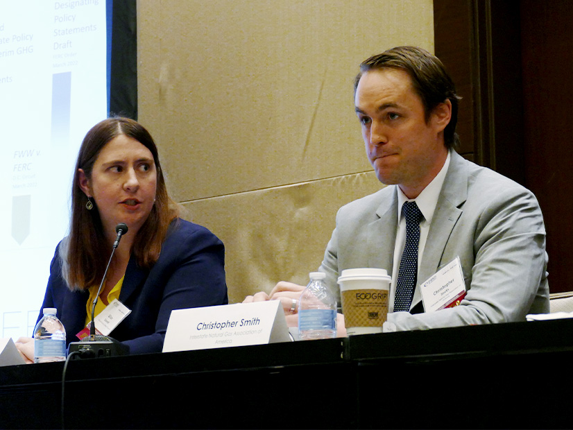 Gillian R. Giannetti, Natural Resources Defense Council (left), with Christopher Smith, Interstate Natural Gas Association of America