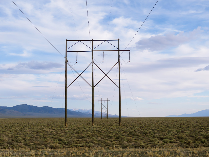 Transmission lines traverse a basin near Highway 50 in central Nevada. 