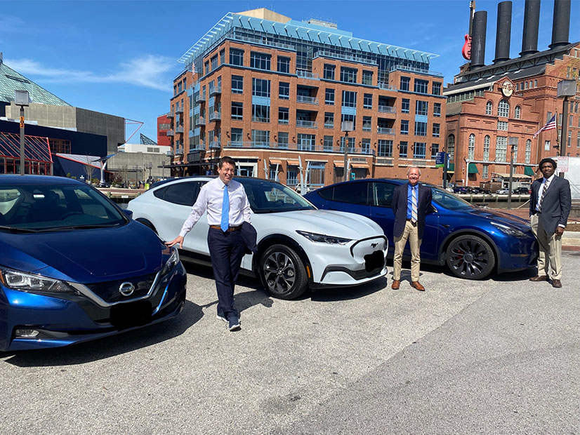 Three of five Maryland Public Service commissioners now drive EVs: (from left) Chair Jason Stanek (Nissan Leaf); Commissioner Michael Richard (Ford Mustang Mach-E) and Commissioner Obi Linton (Tesla).