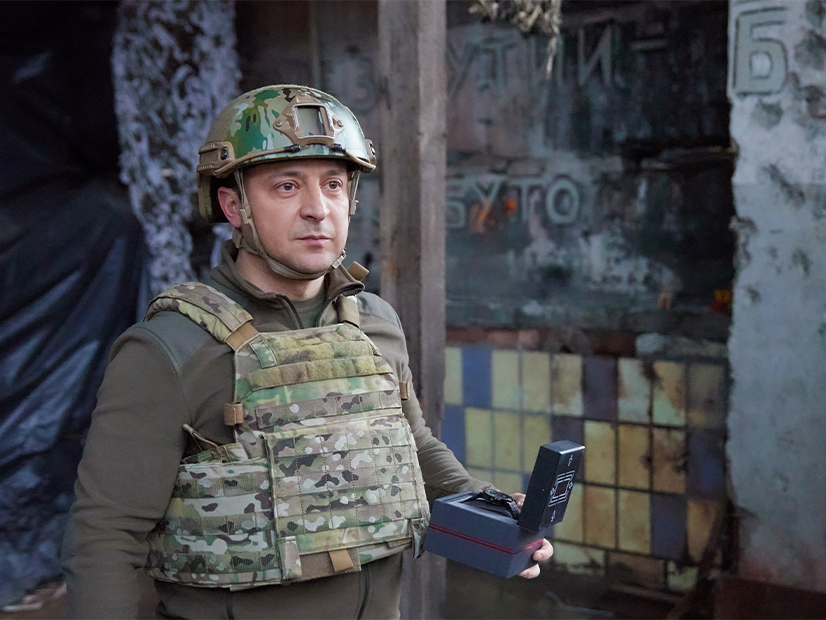 Ukrainian president Volodymyr Zelensky visits frontline troops in Ukraine's Donetsk region Feb. 17. The country's government has called for hackers both inside Ukraine and abroad to help with a cyber offensive against Russia's government, military and economy.
