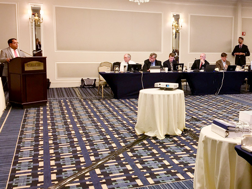 Then-FERC Commissioner Neil Chatterjee speaks at a previous NEPOOL Participants Committee meeting at the Colonnade Hotel in Boston.
