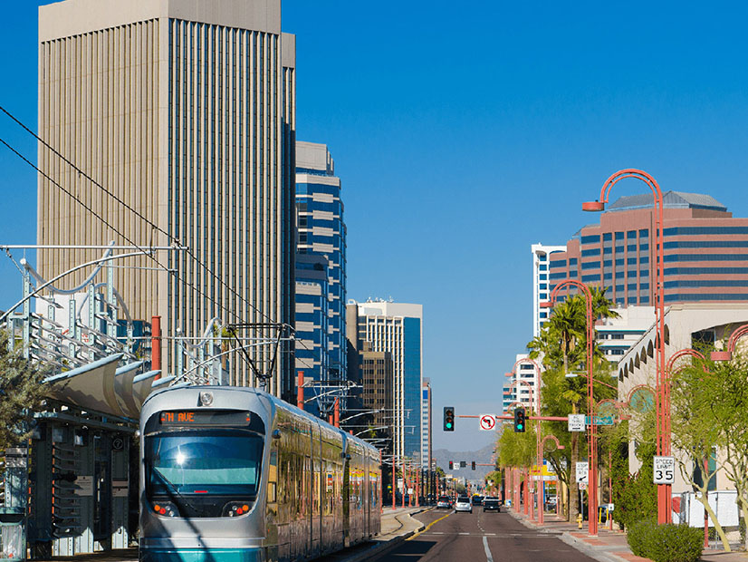 Arizona will face higher costs for power under a new plan requiring utilities to eventual adopt 100% clean energy.