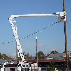 Workers restore power in New Orleans' Warehouse District. Nearly 26,000 emergency workers from 40 states are assisting in restoration efforts in Louisiana in the wake of Hurricane Ida.