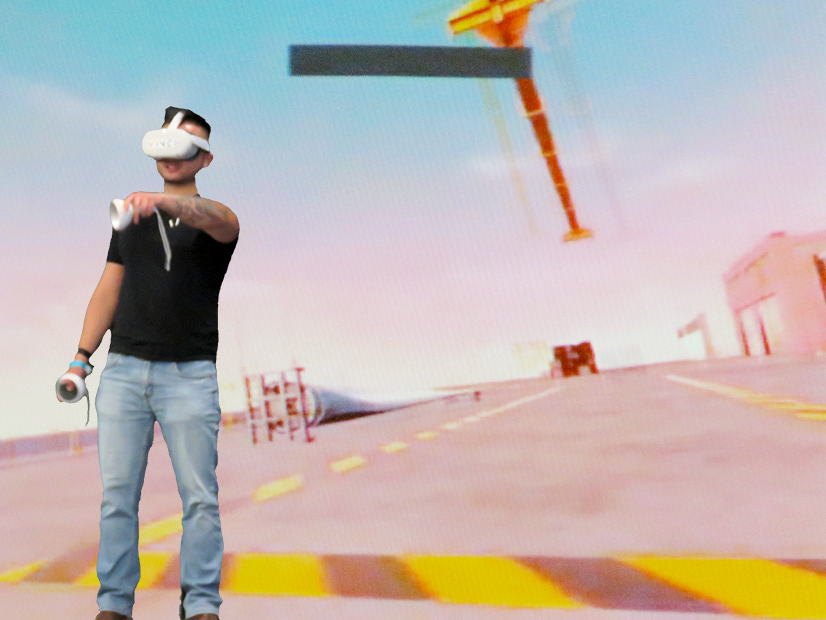 Vinci VR CEO Eagle Wu demonstrates virtual reality training software.