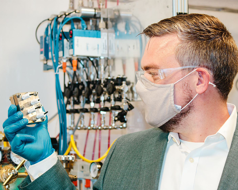 Anders B. Laursen, CEO of RenewCO2, shows a electrochemical reactor used in the company's process to removes carbon dioxide from the air for  the production of industrial chemicals.