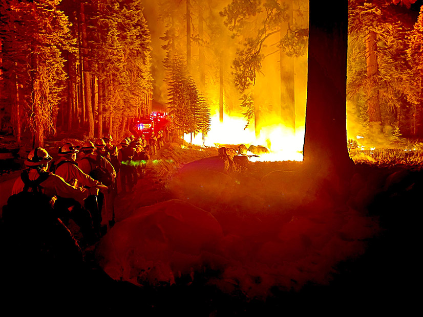 Firefighters work the Dixie Fire on July 29, 2020.
