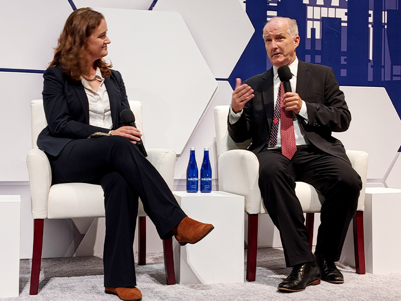 DOE Under Secretary David Crane (right) talks industrial decarbonization with Lindsey Griffith of the Clean Air Task Force at the recent Clean Industrial Summit.