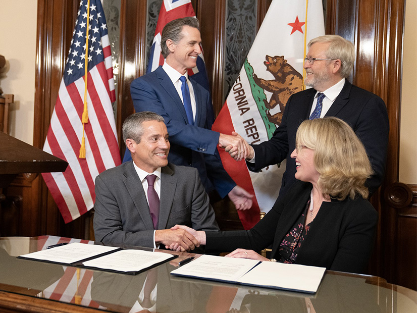 Standing: Gov. Gavin Newsom and Kevin Rudd, Australian ambassador to the U.S. Seated: Wade Crowfoot, California secretary for natural resources, and Jane Duke, consul general of Australia in Los Angeles.
