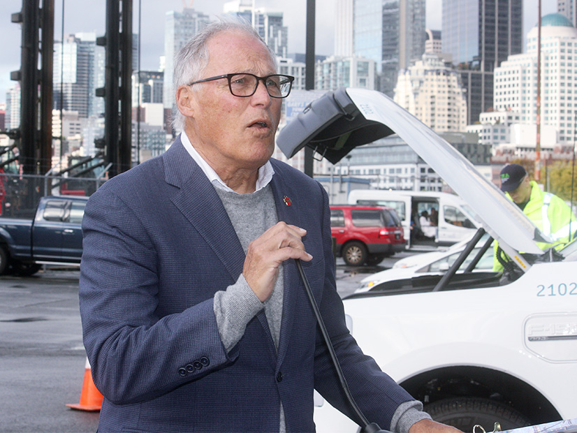 Standing in a Seattle dock area, Washington Gov. Jay Inslee talks about the state's vision to develop an offshore wind manufacturing industry.