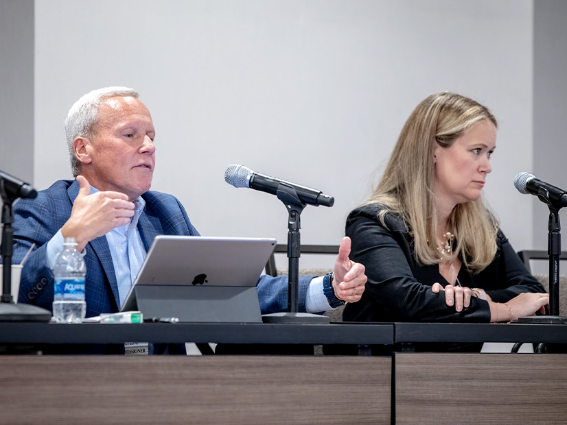 Michael Richard (left), of the Maryland Public Service Commission (PSC), and Pamela Quinlan, principal of GQ New Energy Strategies, moderated a discussion on RTO governance during the Organization of PJM States Inc. annual meeting on Oct. 17.
