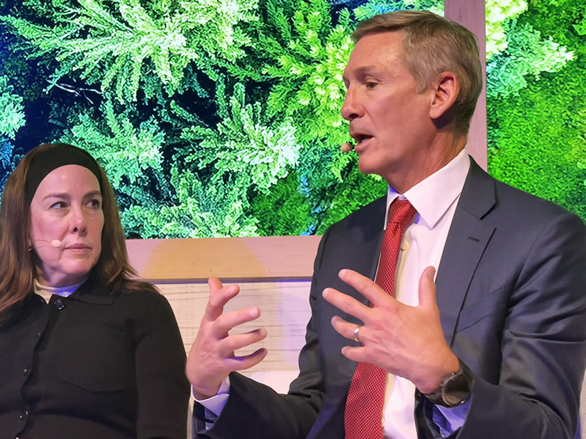 Cindy Levy, McKinsey senior partner, listens to Tom Linebarger discuss energy transition challenges