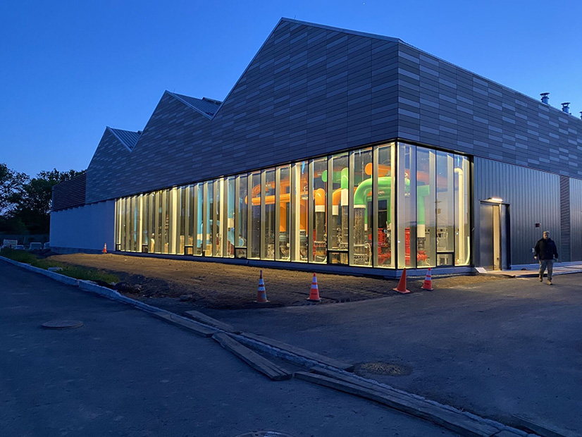 The Thermally Integrated Geo-Exchange Resource (TIGER) system at Princeton University uses geothermal technology to store heat in the ground and then retrieve it to heat the campus later. This building is one of two in final testing before implementation.