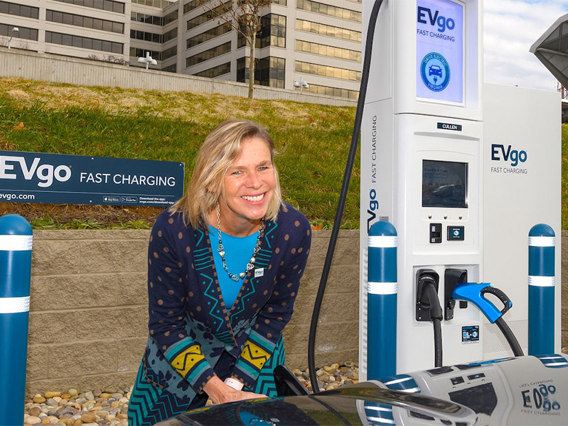Then-CEO Cathy Zoi participates in the grand opening of a new charging site in 2020.