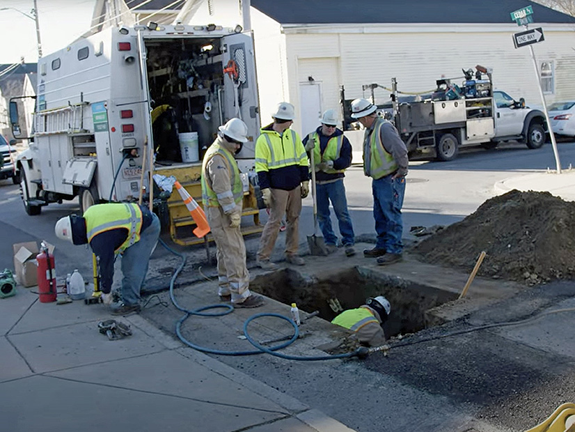 An Eversource crew upgrades a gas line in a scene from a video created by the company. 