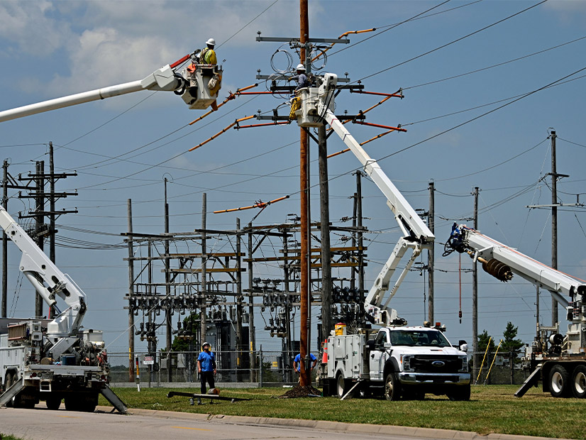 Crews upgrade power lines in Emporia, Kansas. FERC this week partially accepted SPP's second compliance filing for Order 881.