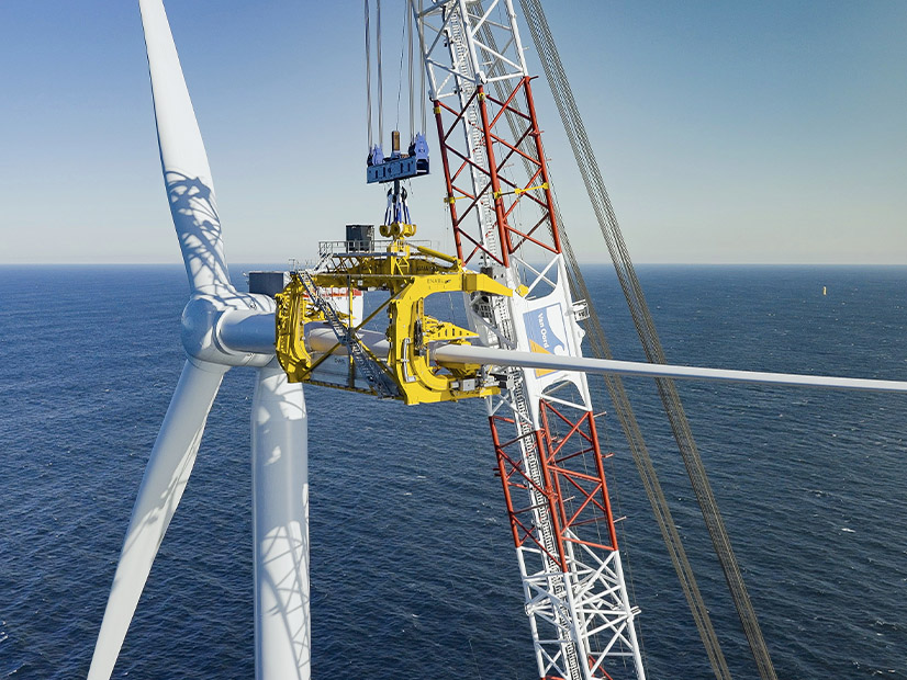 A blade is affixed to the the first turbine installed at the South Fork Wind project in November.