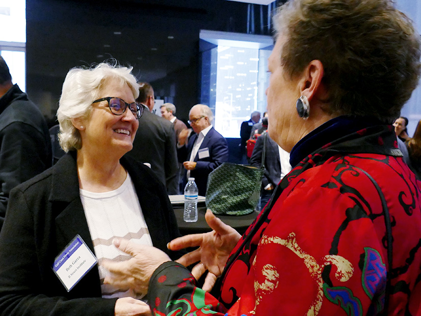 New GCPA President Beth Garza chats with member Beth Emery following the group's annual meeting. 