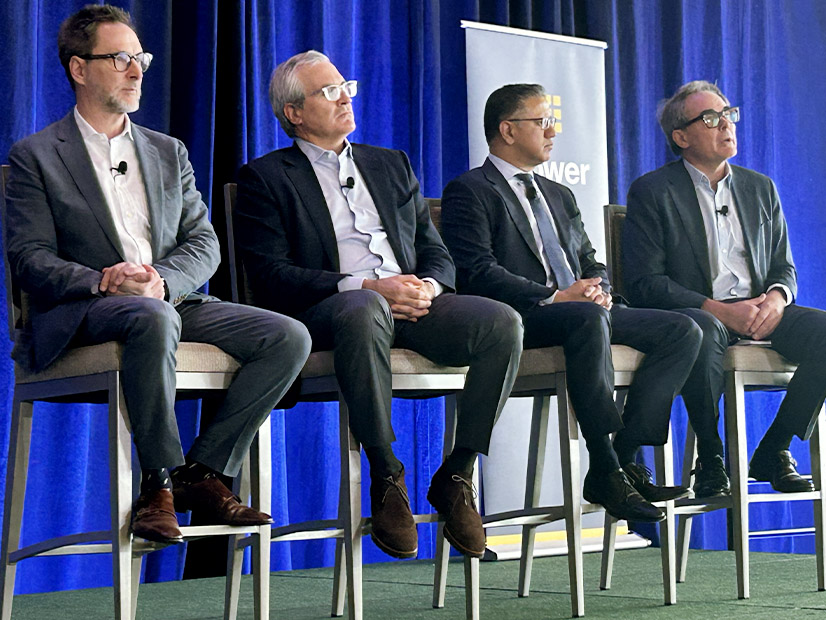 From left: CPower CEO Michael Smith, REV Renewables CEO Edward Sondey, EVGo CEO Badar Khan and Endurant CEO Tom Chadwick