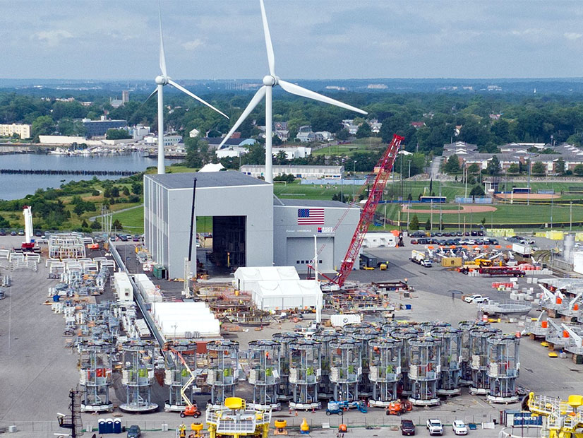 Foundation components for Revolution Wind are shown in September 2023 in Providence, R.I. A lawsuit seeks to invalidate federal approvals for the offshore wind project.