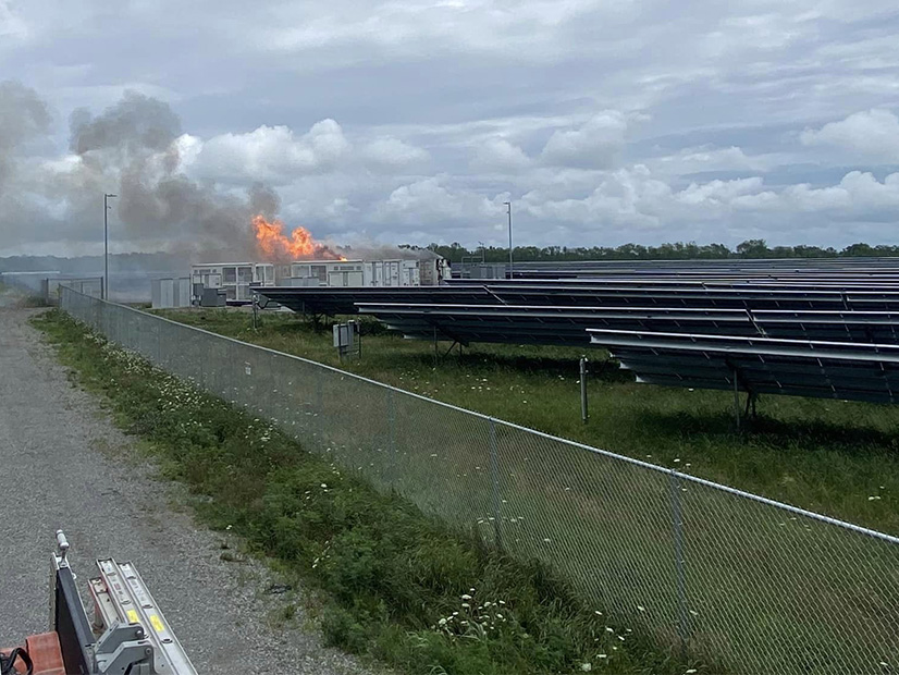 A battery energy storage system fire burns near Chaumont, N.Y., in July 2023.