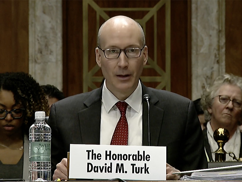 Deputy Energy Secretary David Turk testifies before the Senate Energy and Natural Resources Committee on Feb. 8.