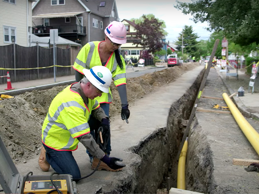 National Grid gas workers replace a gas main in a promotional video