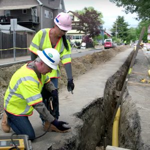 National Grid gas workers replace a gas main in a promotional video