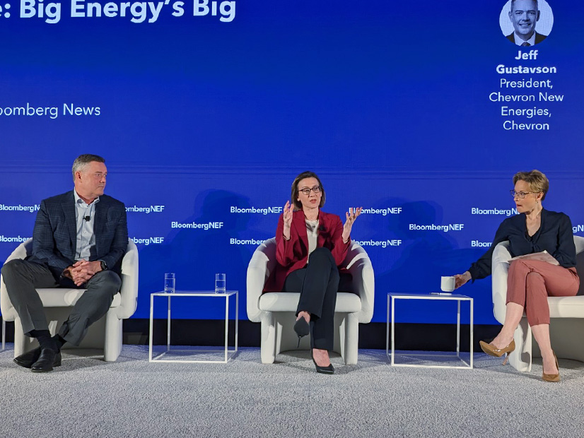 Fossil fuel executives Jeff Gustavson of Chevron (left) and Anna Mascolo of Shell (center) lay out their vision of the role of "low-carbon" technologies in the energy transition, with moderator Alix Steel of BNEF. 