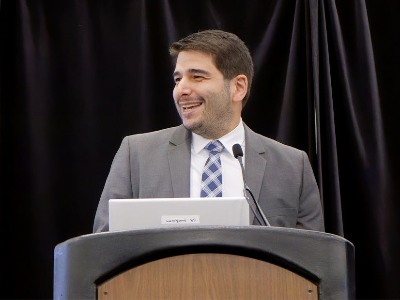 Houtan Moaveni, executive director of the New York Office of Renewable Energy Siting, speaks at the New York Energy Summit in Albany in April.
