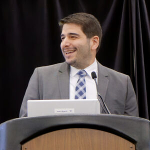 Houtan Moaveni, executive director of the New York Office of Renewable Energy Siting, speaks at the New York Energy Summit in Albany in April.