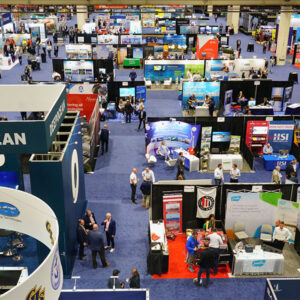 IPF24 attendees roam the exhibit hall of the Ernest N. Morial Convention Center in New Orleans on April 24