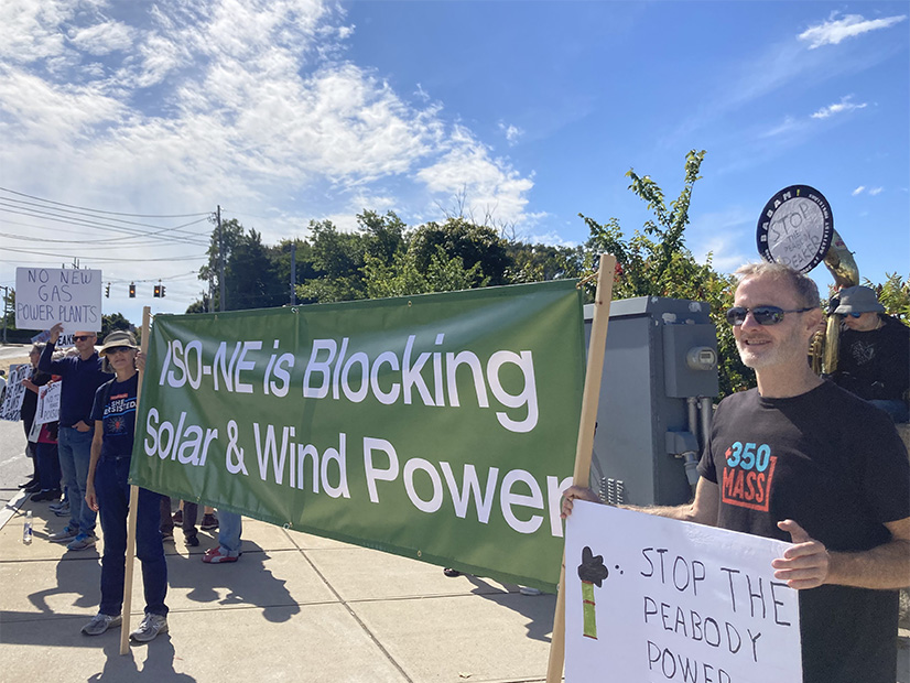 Activists in Peabody, Mass., protesting the construction of a peaker plant in 2022
