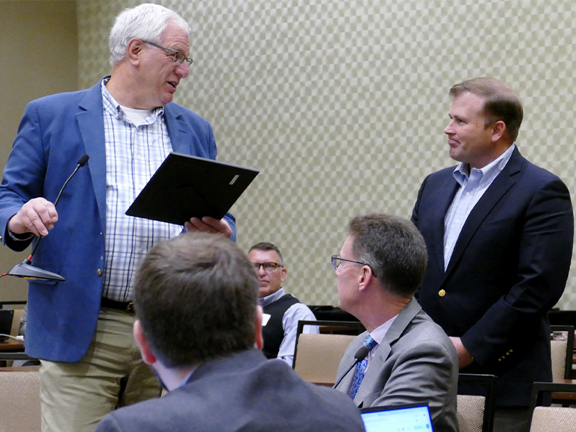 RSC president John Tuma honors ex-Texas commissioner Will McAdams for his service.