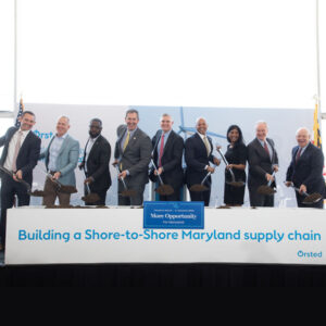 Maryland Gov. Wes Moore, fourth from right, and other dignitaries break ground for the state's first offshore wind advanced foundation component center at Tradepoint Atlantic in April 2023.