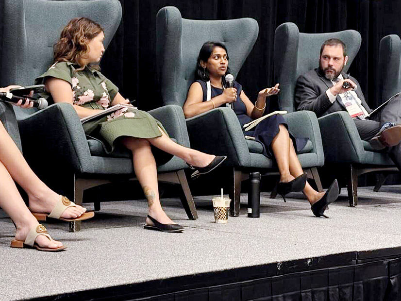 Jupiter Power's Caitlin Smith (left) and Vistra's Ned Bonskowski listen to Shell Energy's Resmi Surendran during an Infocast panel discussion. 